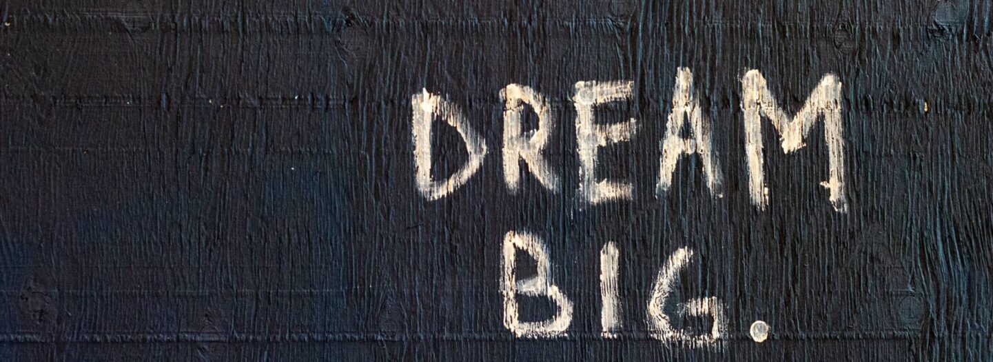 Image of the words "Dream Big" on a piece of wood